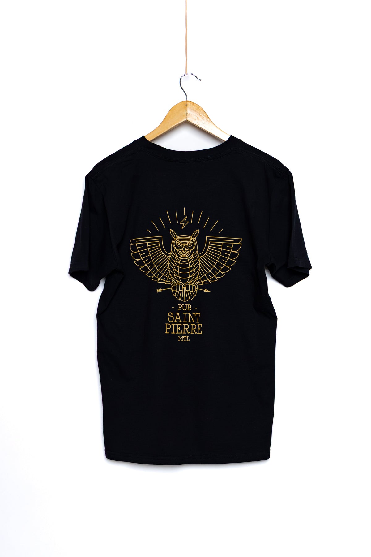 Back of the black Pub Saint Pierre t-shirt on a white background, gold owl graphic